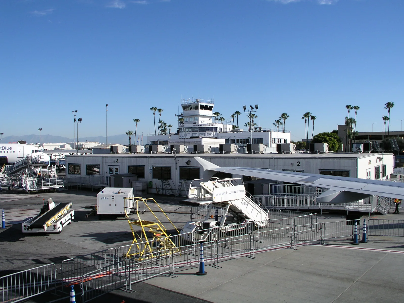 Long Beach Airport's terminal and control tower viewed from the aircraft apron in 2009