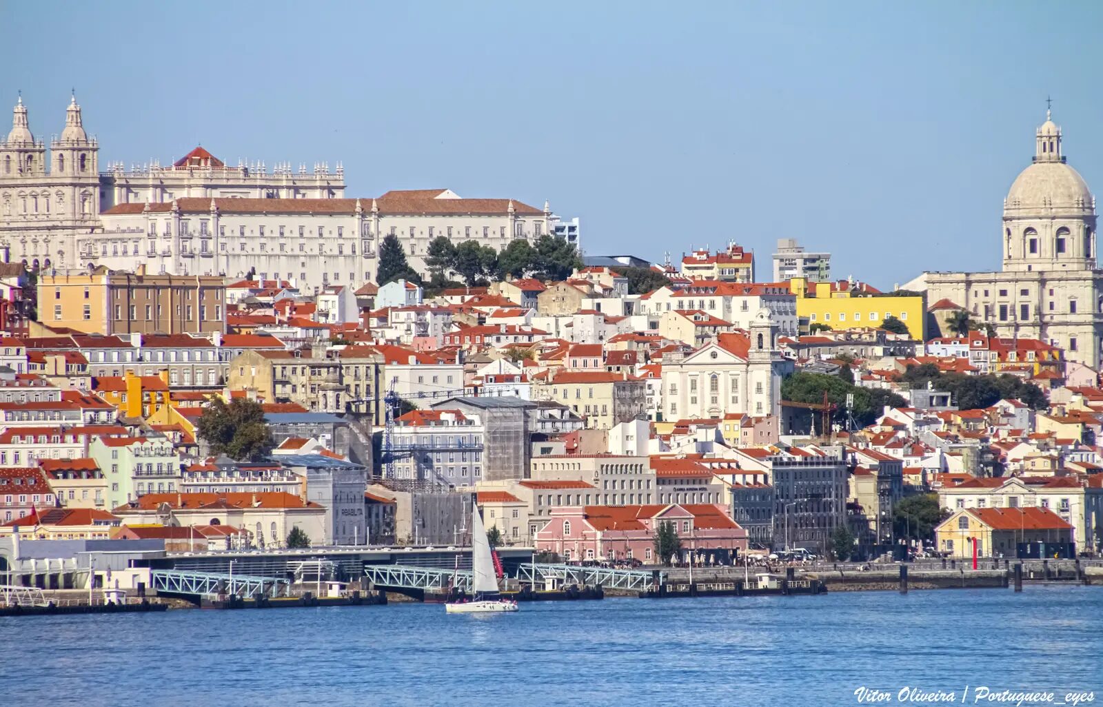 Hillside cityscape and waterfront in Lisbon, Portugal